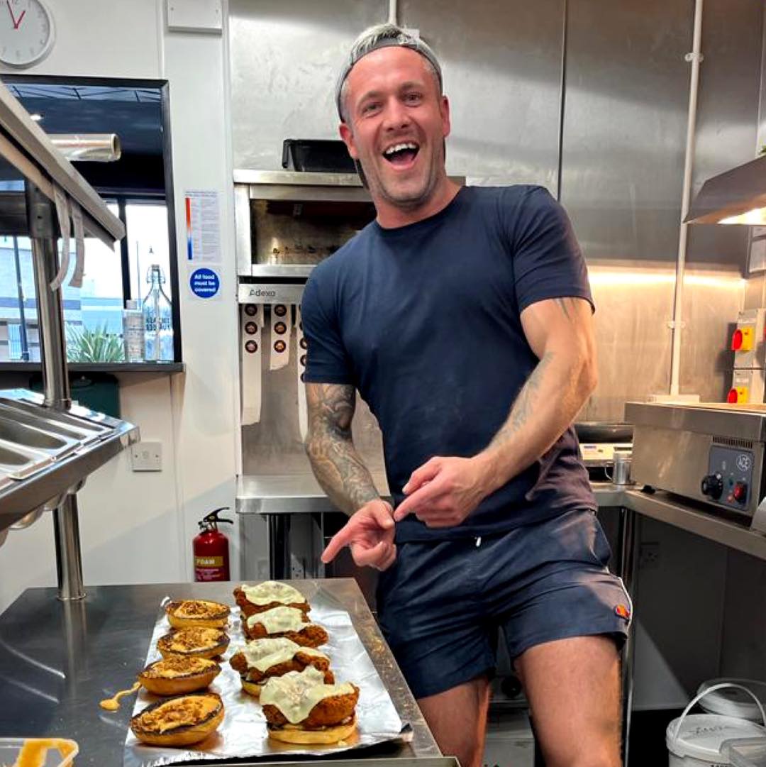 Ash Gutsell cooking smash burgers in the kitchen